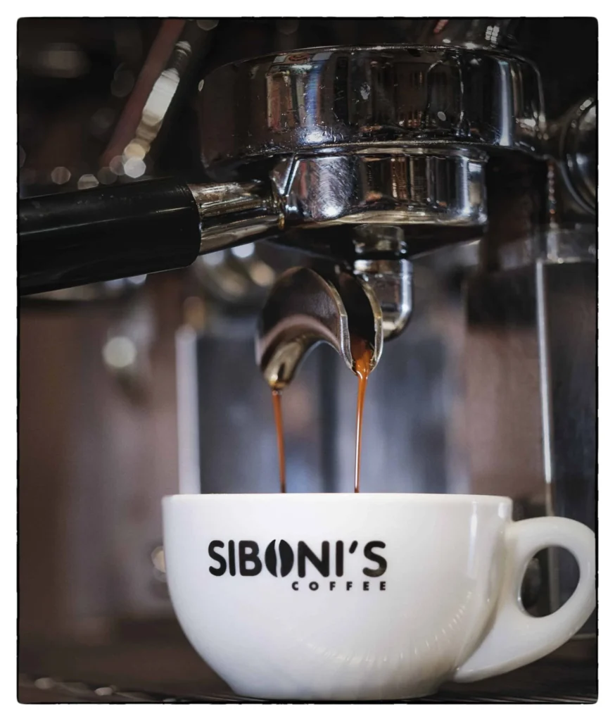Espresso pulling into a Siboni's Coffee cup