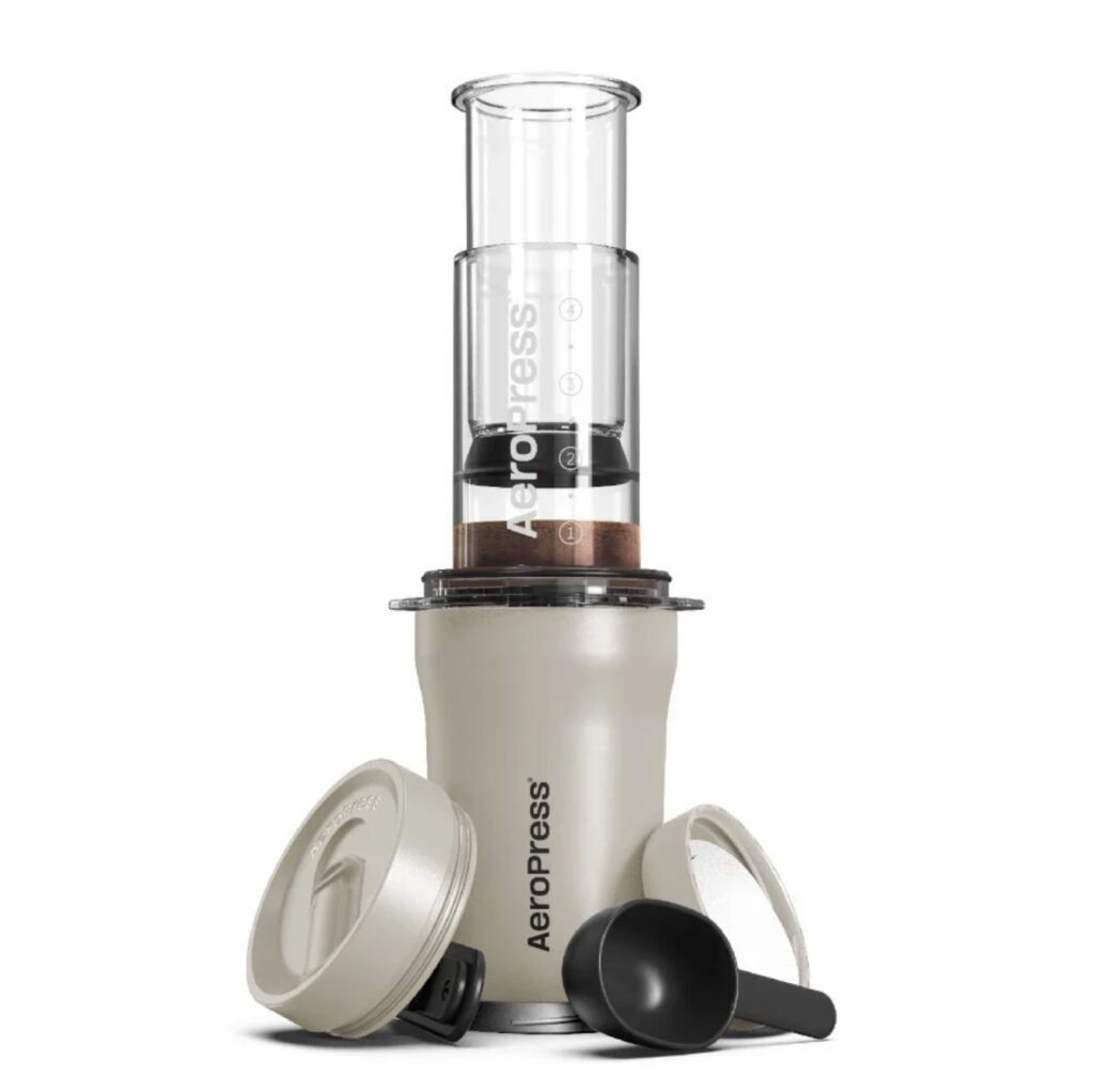 AeroPress Go portable coffee maker in cream, on white background