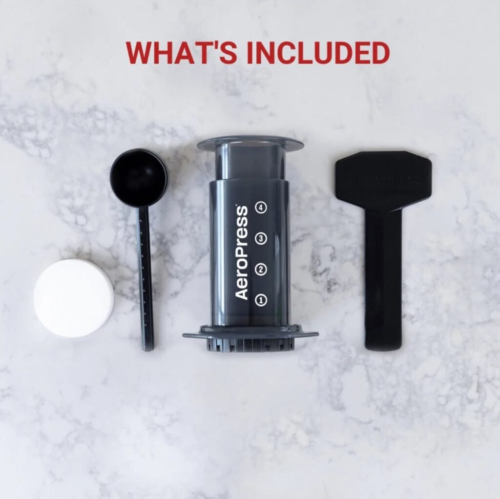 AeroPress original — what's included: press, scoop, filter cap and stirrer